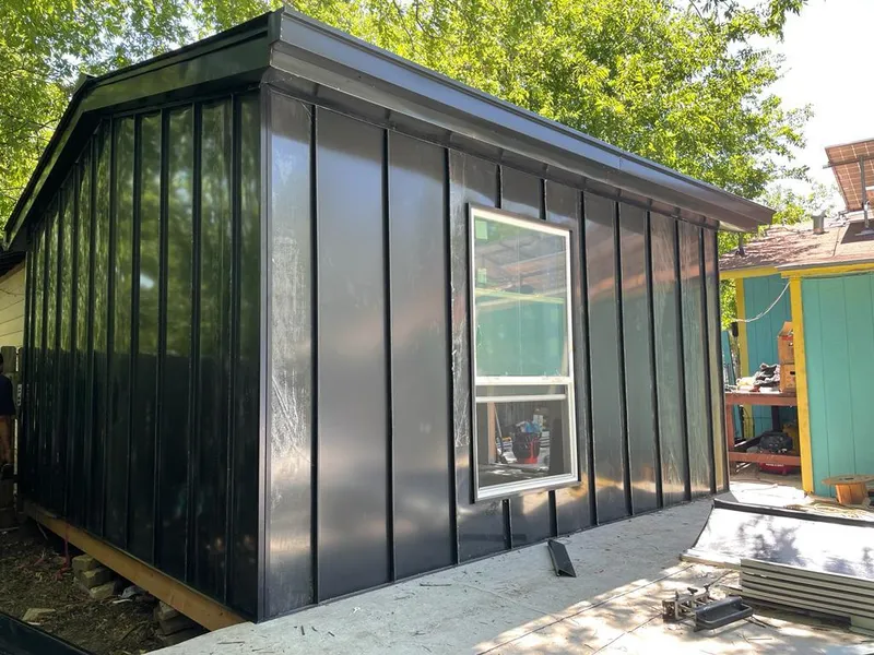 Black standing seam metal wall panels for Metal Roof Installation in Elizabeth City